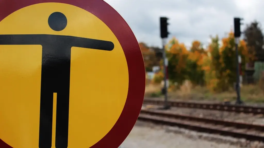 A foggy railway platform or station sign