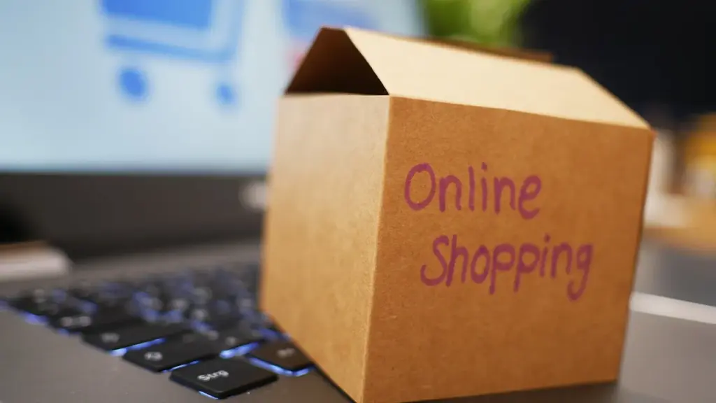 Close-up of an online shopping cart on a laptop with gadgets