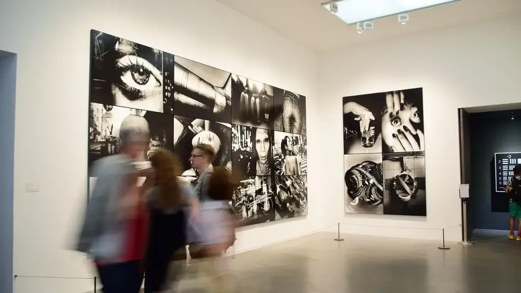 Visitor viewing artworks in a museum setting