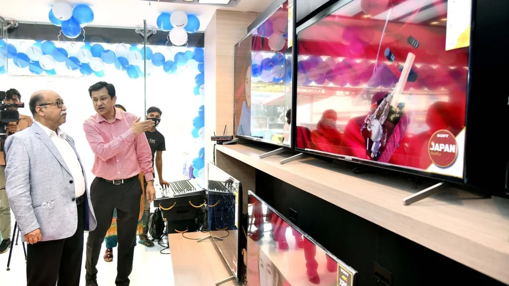 Smart TV on a showroom floor showing a home screen