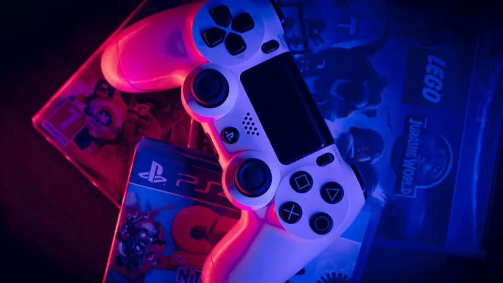 A PS5 console and controller on a desk, ready for gaming