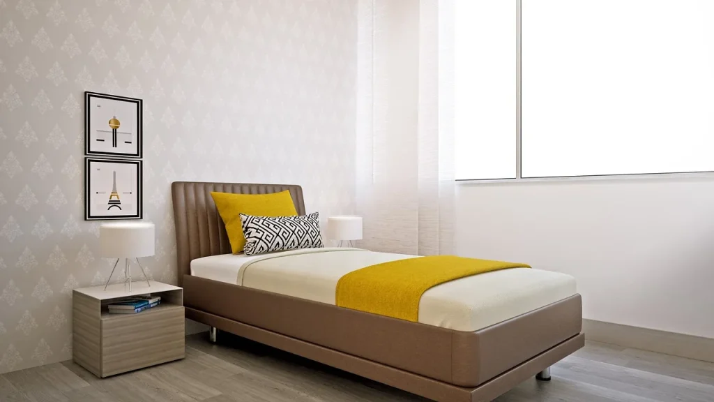A person in bed with a wakeup light visible in the room