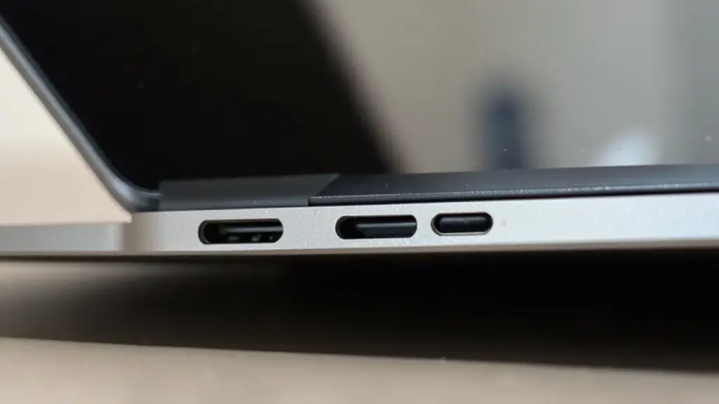 Side view highlighting magnetic charging area and clean chassis.