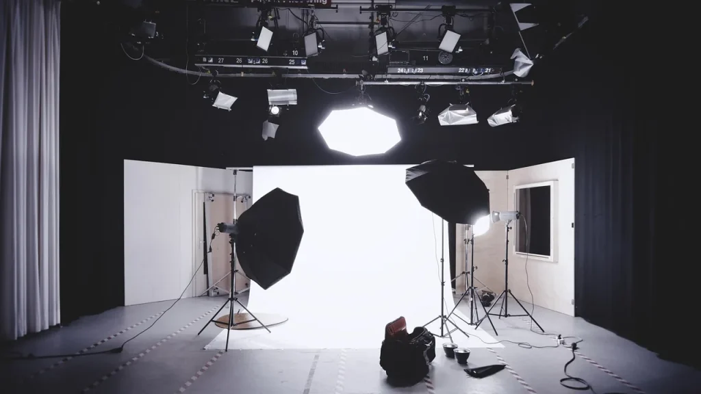 Person taking a photo in a bright room with even lighting