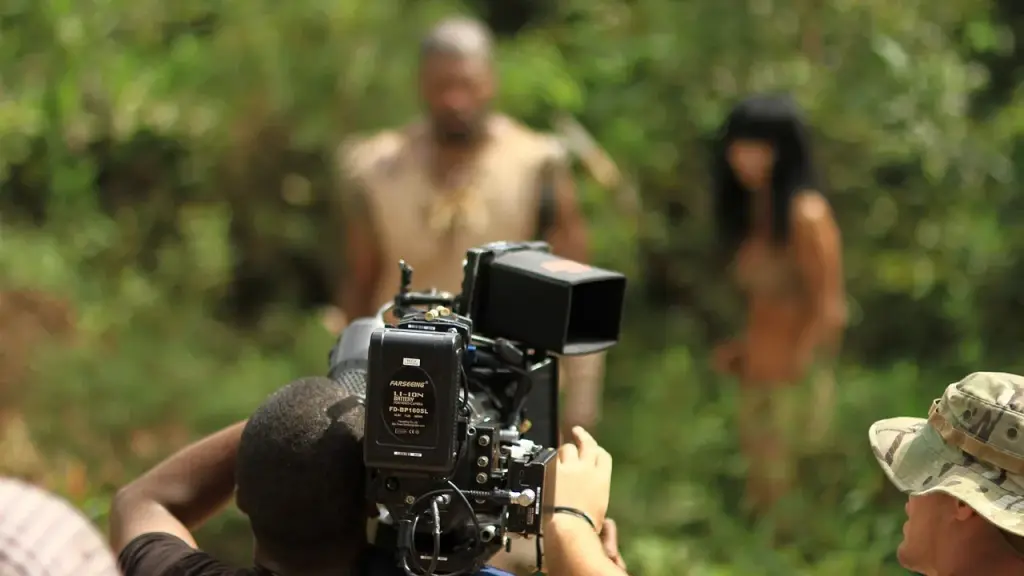 Behind-the-scenes view of a movie production with cameras and lights