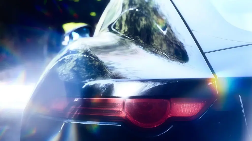 A sleek electric car on a stage, concept car lighting