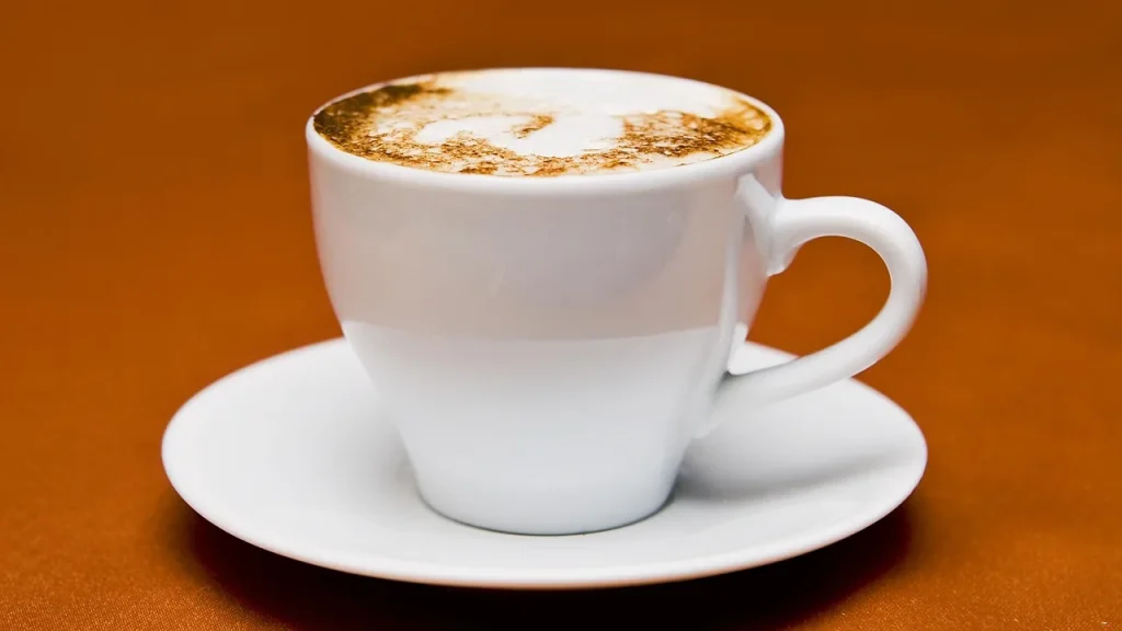 Espresso cup and setup showing a rich brew