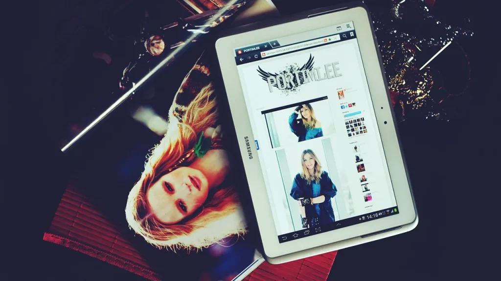 Person reviewing About You notes on a tablet
