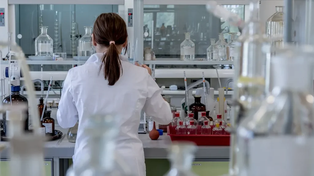 A modern AI research lab with data screens and equipment