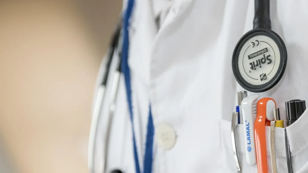 A doctor holding a stethoscope