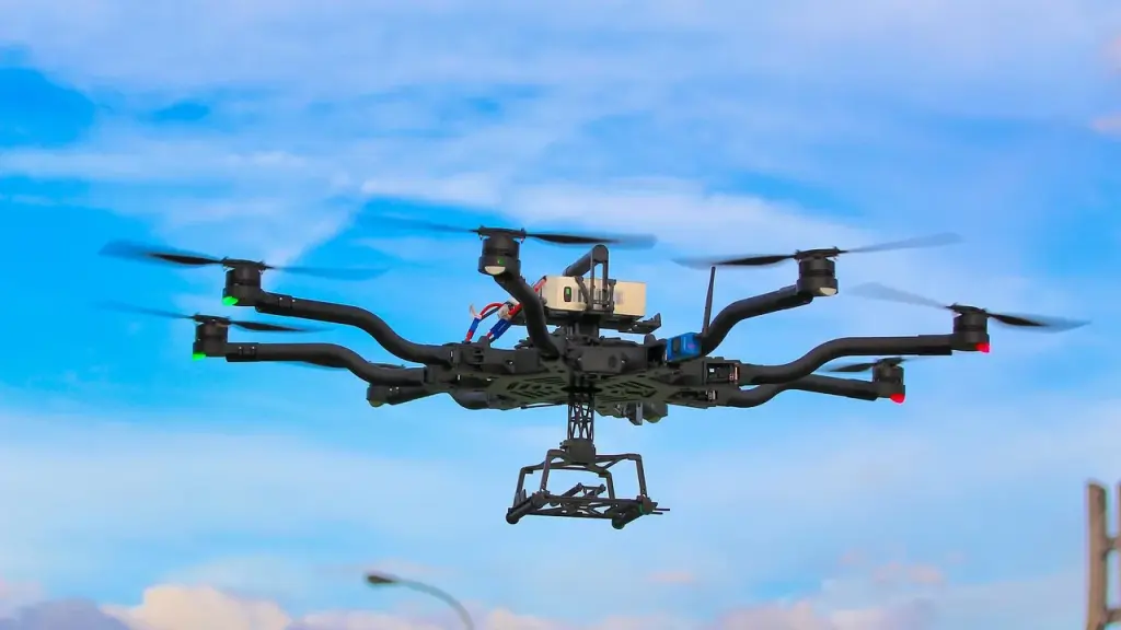 A military drone testing area with equipment and field setup