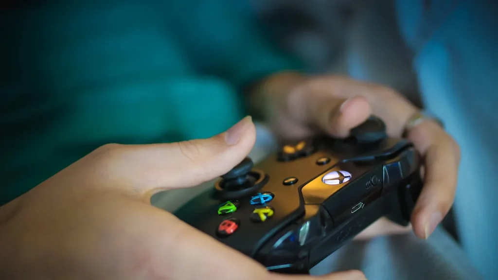 People playing video games on a living room setup with a console