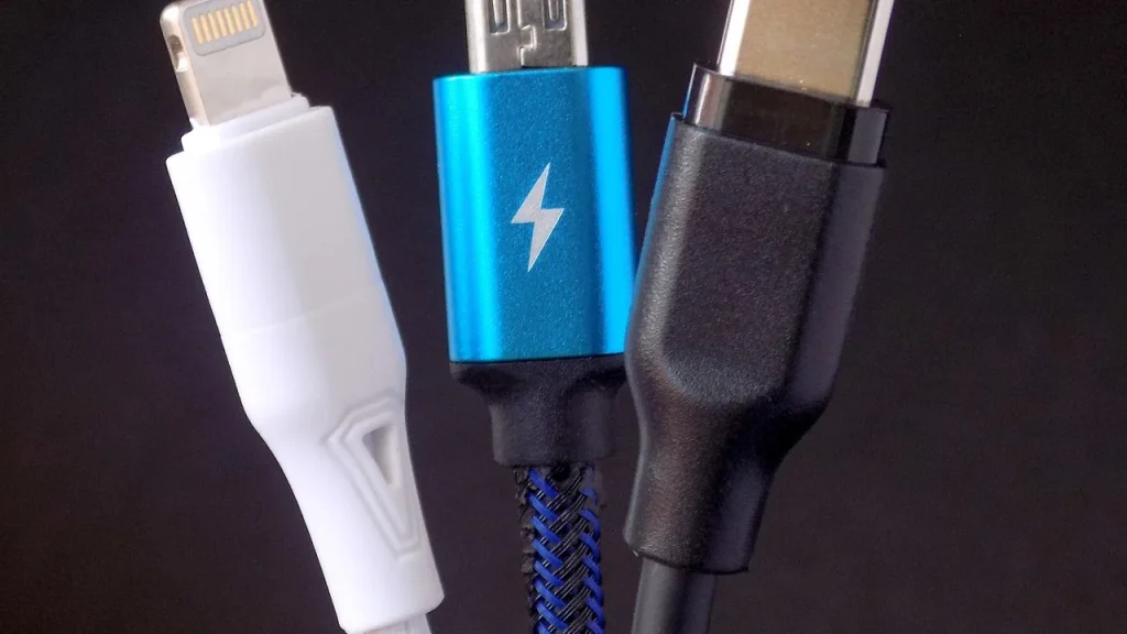 Hands plugging a USB-C cable into a device