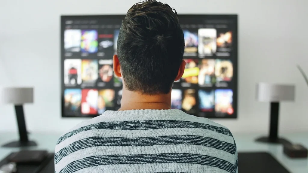 Screens showing different movie listings on a streaming store