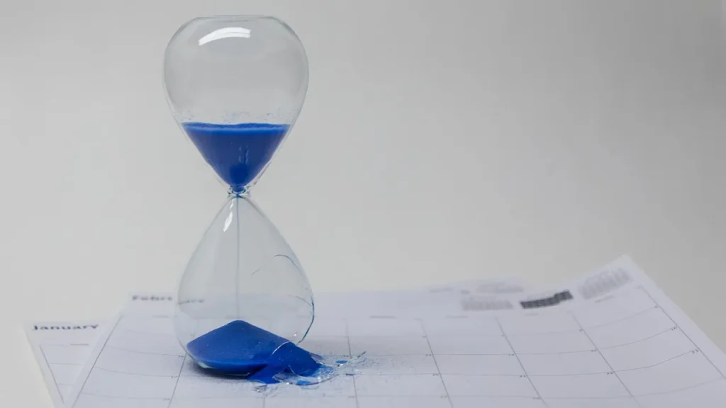 A calendar and clock to symbolize scheduling
