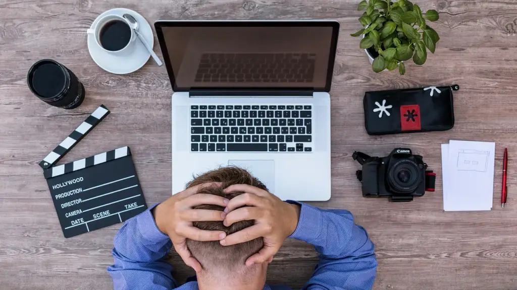 Office worker typing at a computer in an office setting