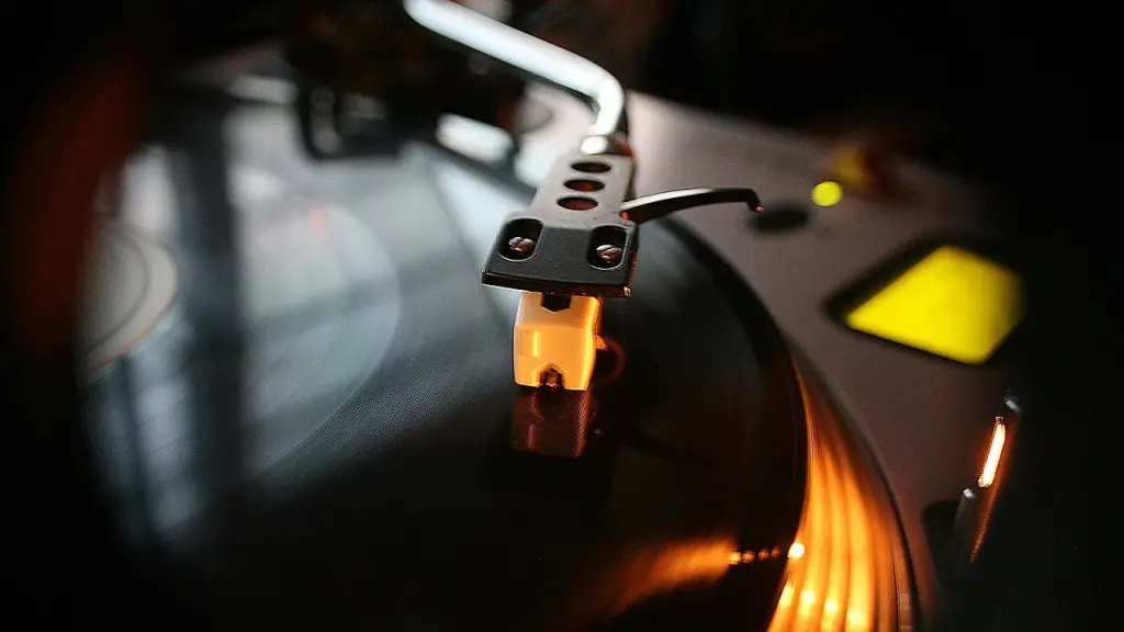 Close-up of vinyl records and colorful sleeves on a shelf