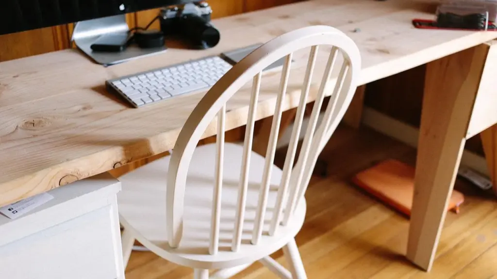 A home workstation on a desk with monitor and keyboard