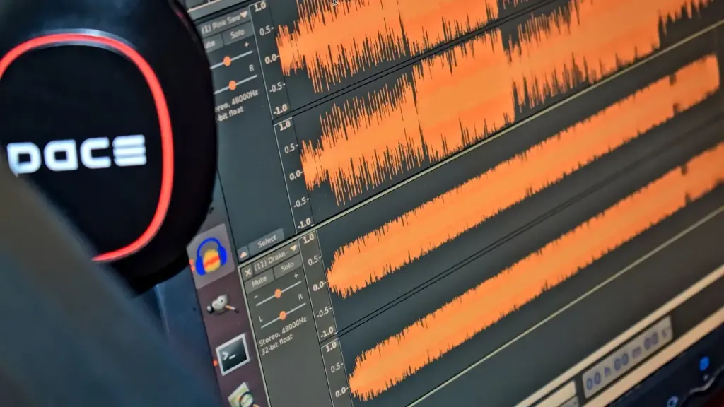 Laptop screen showing an audio waveform in a quiet setting